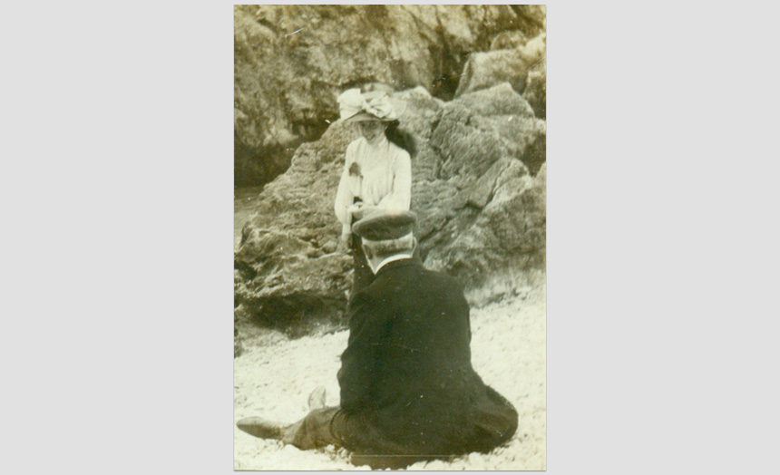 Dorothy Theomin. As a young woman (smiling) with her father on a beach.