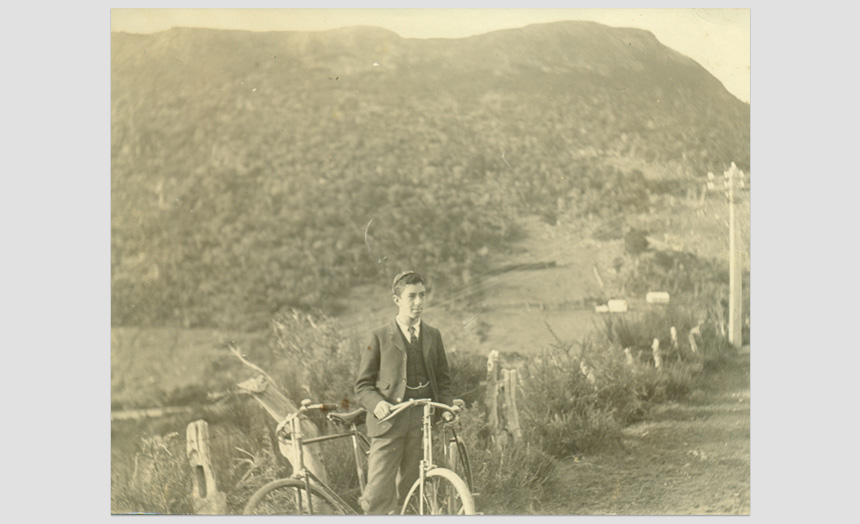 Edward Theomin. As a youth, with bicycle.