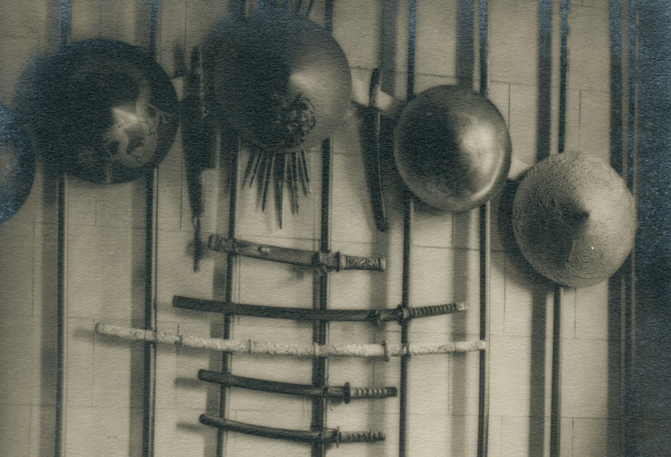 Vestibule with Japanese swords, pole spears and helmets. Photo taken at an earlier period.